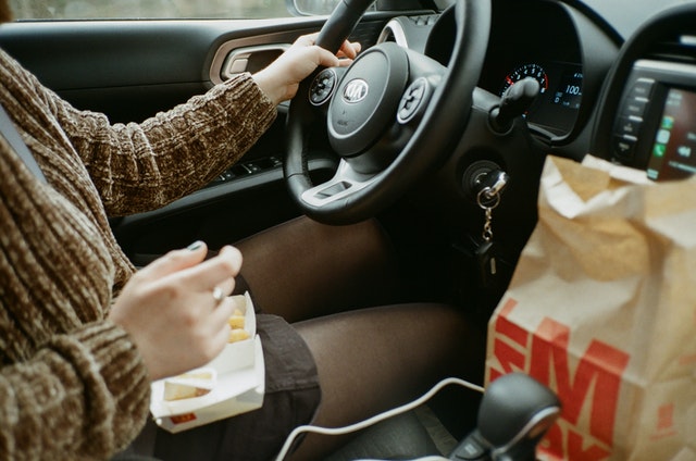 person eating while driving